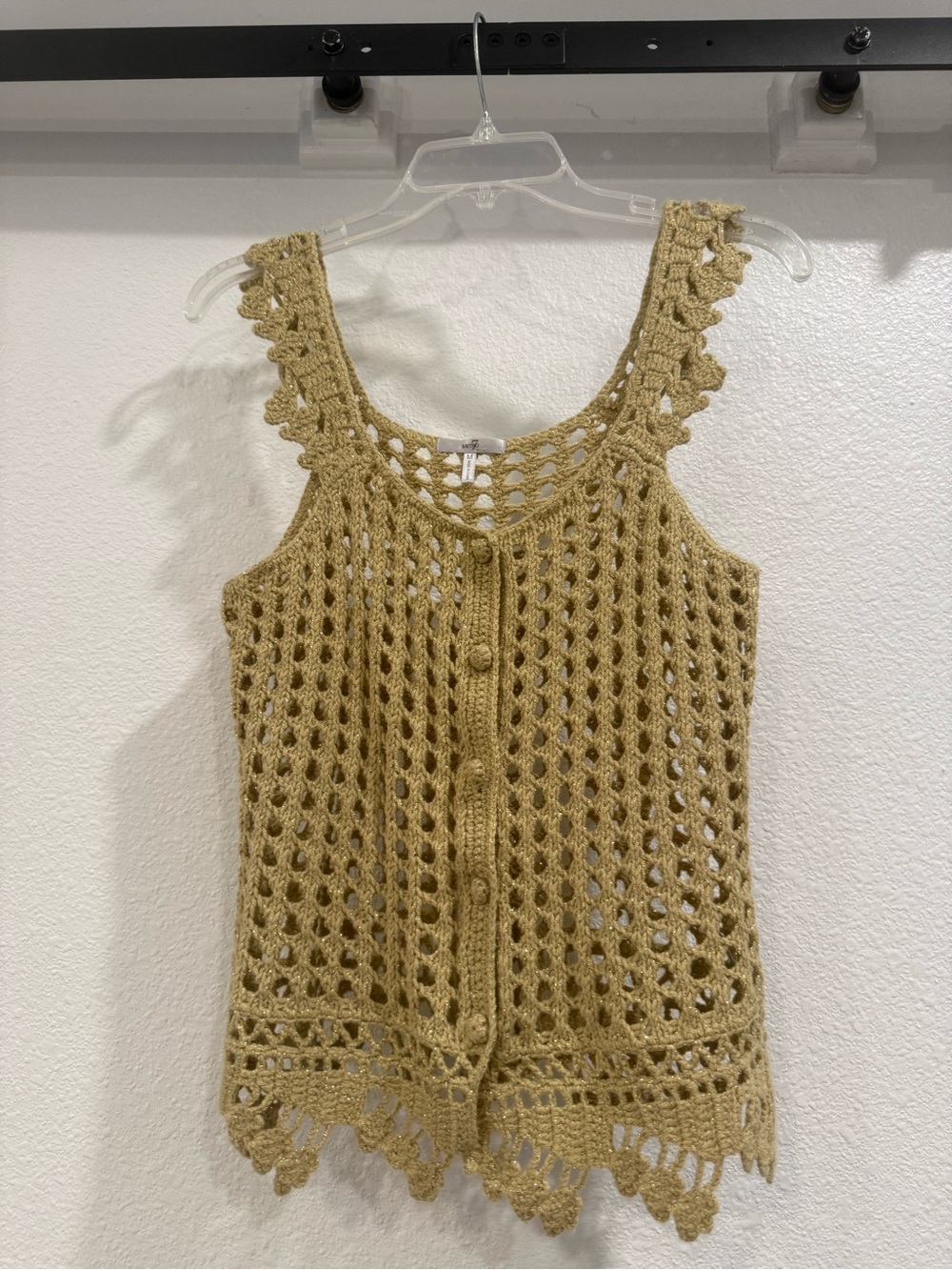 Vintage crocheted vest, yellow gold yarn with gold metallic specs. Very pretty!
